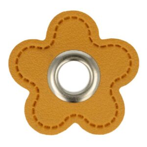 Öös kollasel kunstnahal, aplikatsioon, lill